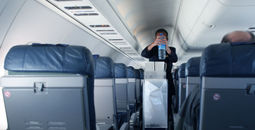 Flight attendant with beverage cart