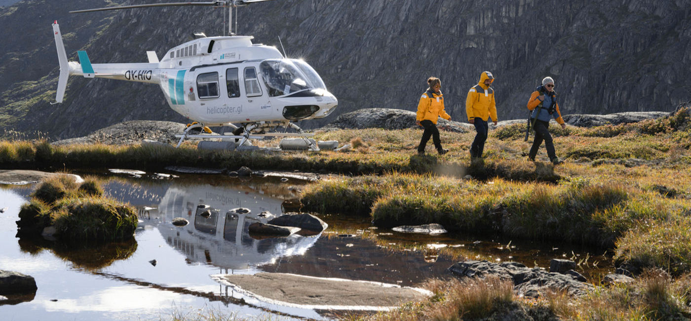Image: One of Quark Expeditions' onboard helicopters transports guests to remote areas of Greenland. (photo courtesy of Quark Expeditions/Carlo Lukassen)