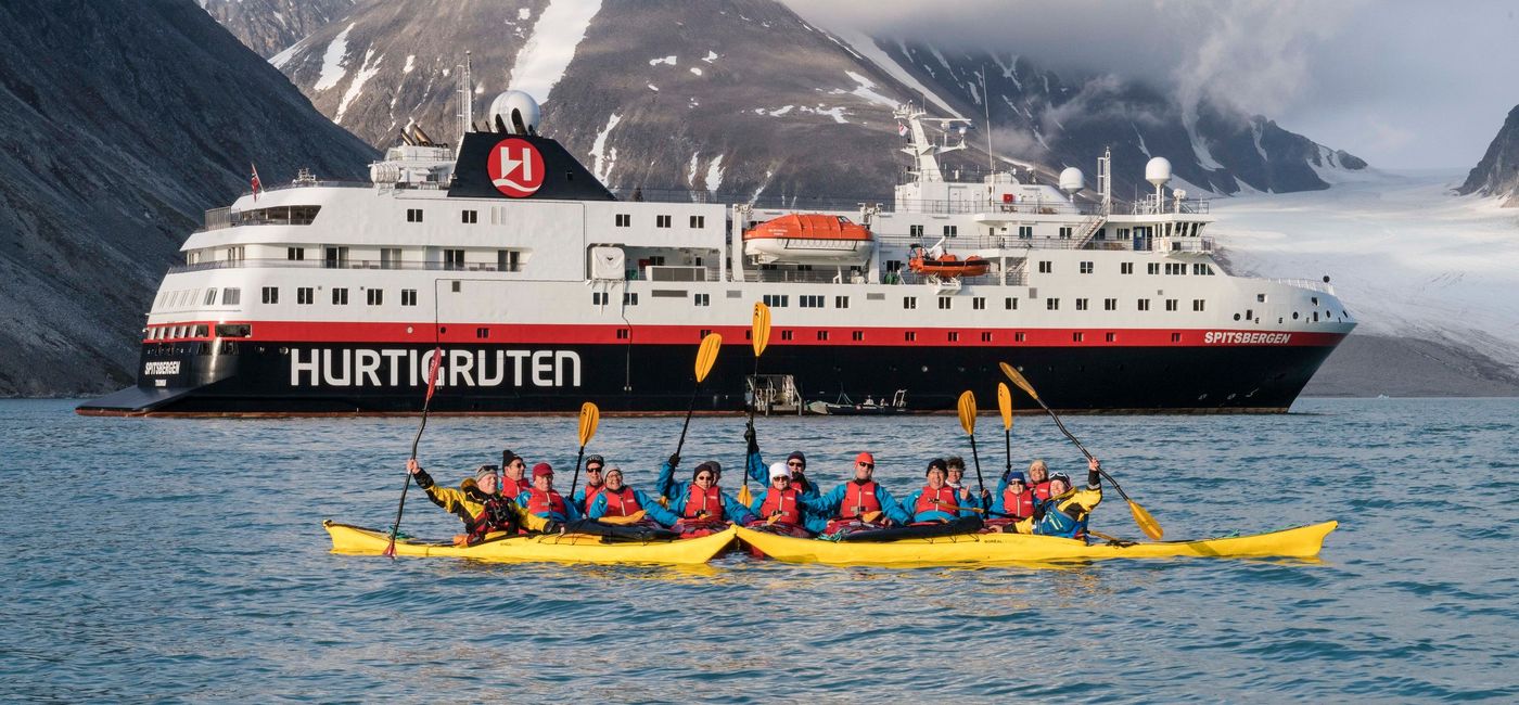 Image: A group of travelers in Svalbard. (photo via Hurtigruten)