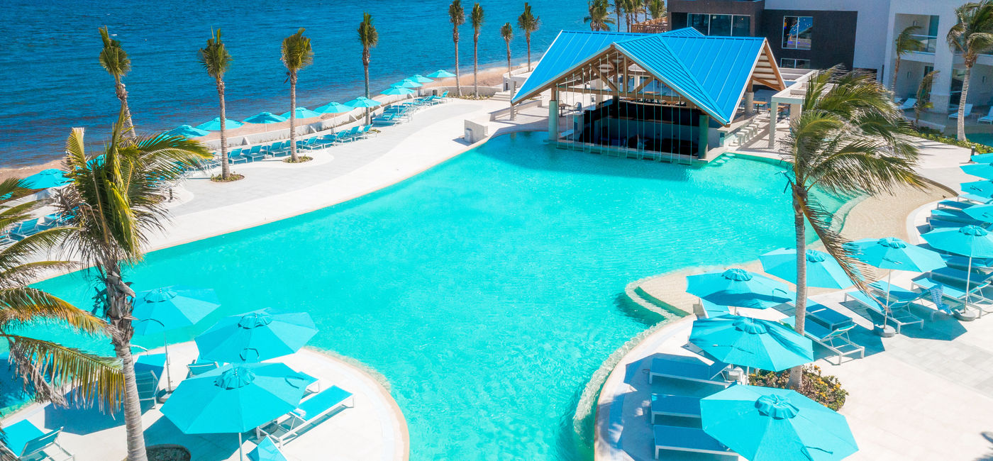 Image: A pool area overlooking the sea at the new Margaritaville Beach Resort Riviera Maya.  (Photo Credit: Karisma Hotels & Resorts)