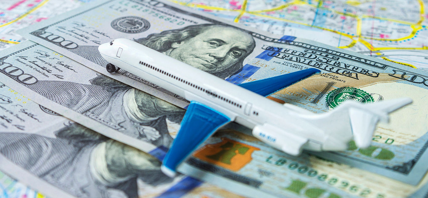 Image: Airline fees and revenue.  (Photo Credit: iStock/Getty Images Plus/Evgen_Prozhyrko)