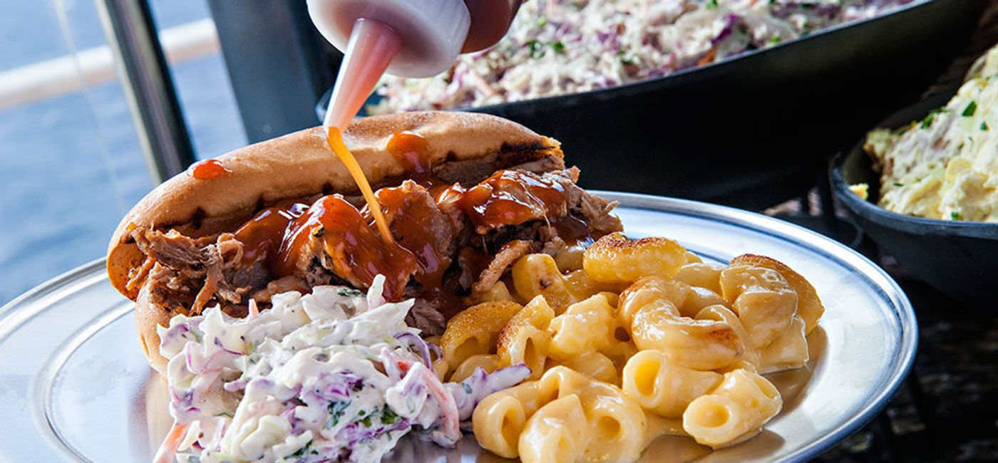 Image: PHOTO: Guy’s Pig & Anchor Bar-B-Que Smokehouse on Carnival Cruise Line's Carnival Breeze. (photo courtesy of Carnival Cruise Line)