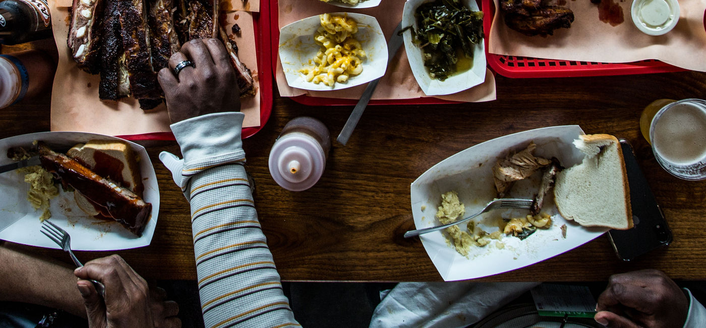 Photo: Diners enjoying barbecue at Rodney Scott'. (Photo via Rodney Scott's Whole Hog BBQ) (Rodney Scott's Whole Hog BBQ)