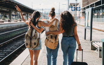 Three friends enjoying a trip together.