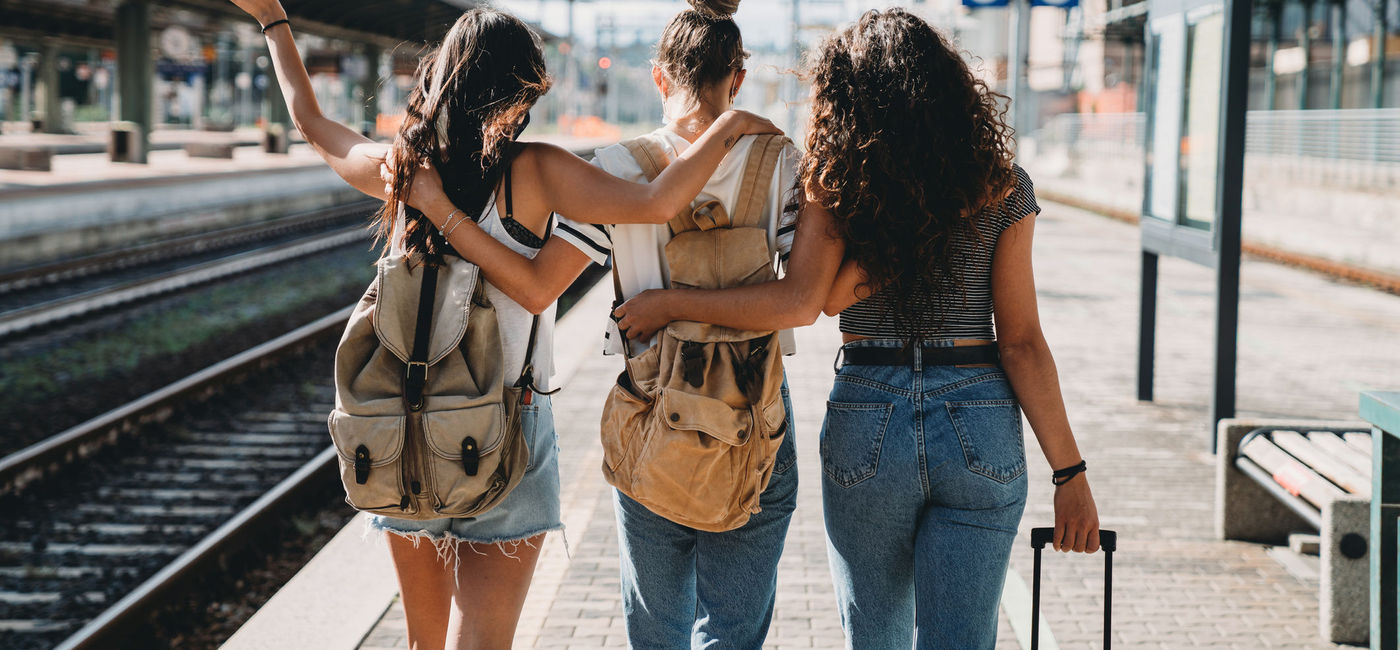 Image: Three friends enjoying a trip together. (photo via FilippoBacci / E+)