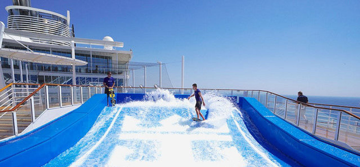 Image: PHOTO: A FlowRider surf simulator installed aboard Royal Caribbean's Harmony of the Seas. (photo by Jason Leppert)