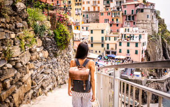 Traveler enjoy Italy's Cinque Terre Traveler enjoy Italy's Cinque Terre