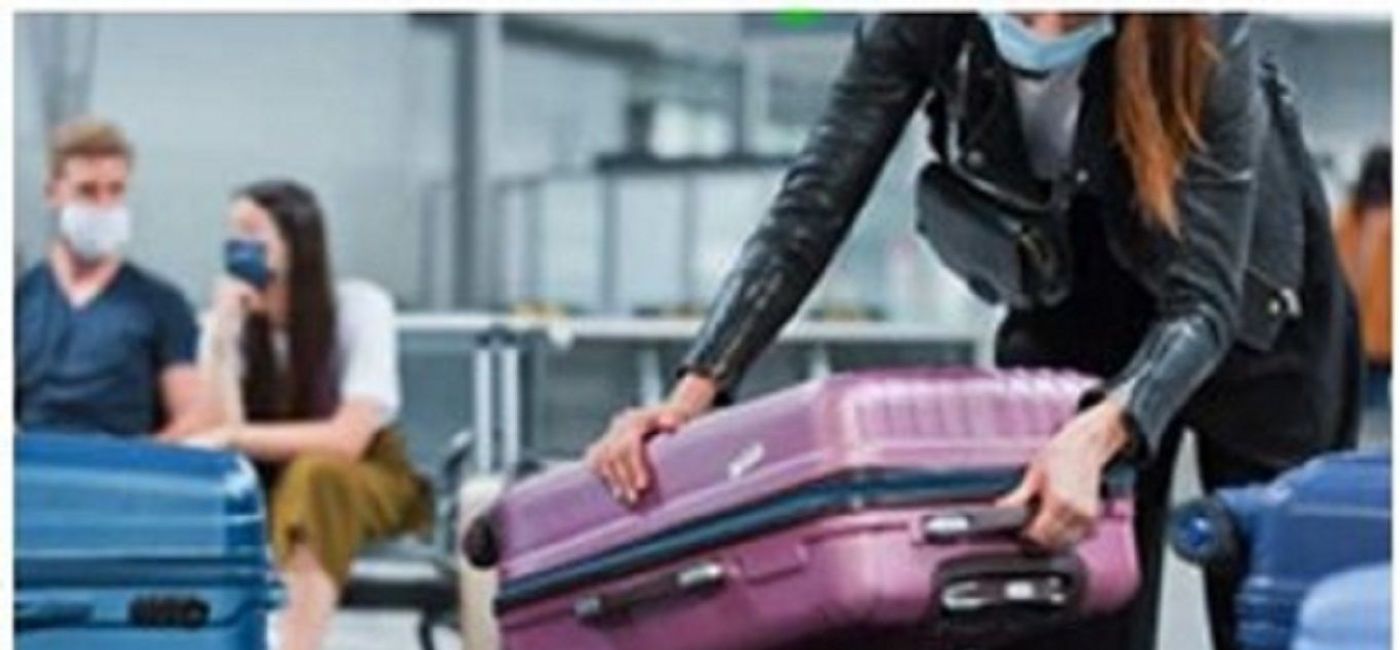 Image: Travelers in an airport. (photo via Manulife)