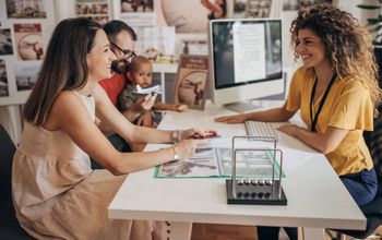 A family working with a travel advisor