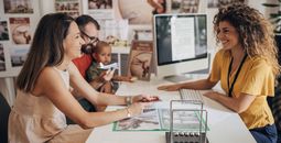 A family working with a travel advisor
