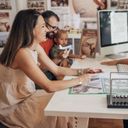 A family working with a travel advisor