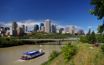A riverboat cruises the North Saskatchewan River in Edmonton, Alberta, Canada