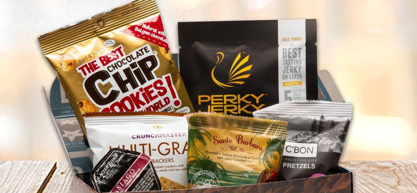Image: PHOTO: Donated Pacific Surfliner snack packs include turkey jerky, Asiago cheese spread, multigrain mini pretzels, trail mix, chocolate chip cookies and a peppermint taffy. (photo courtesy of the LOSSAN Rail Corridor Agency)