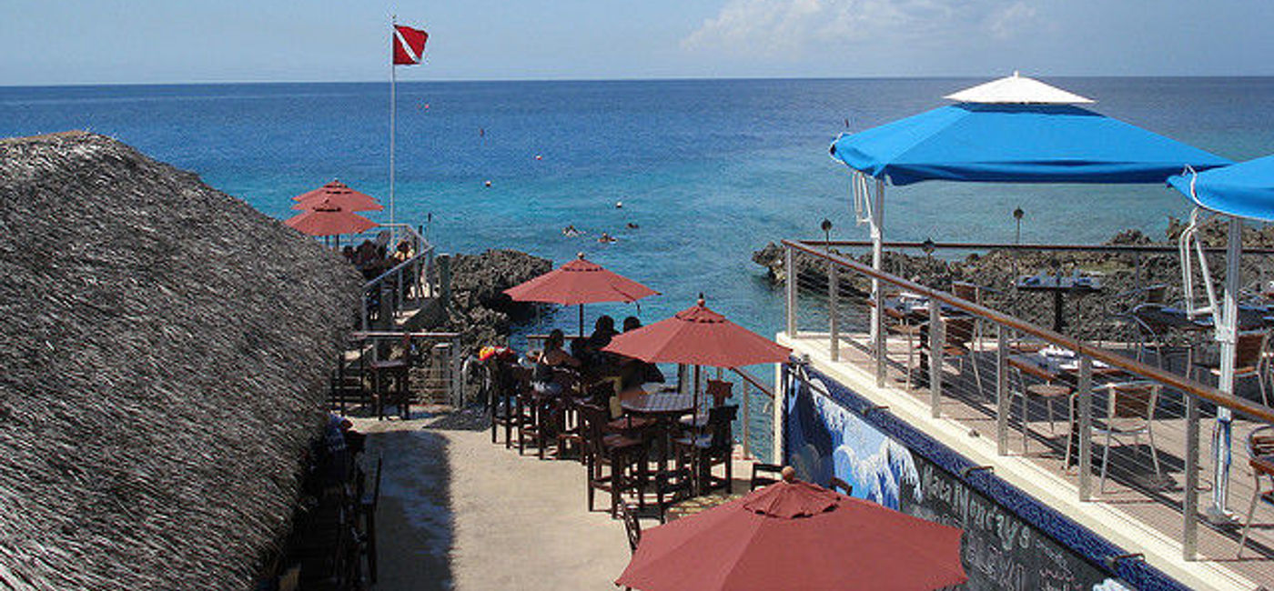 Image: PHOTO: The view from the Cracked Conch Restaurant in the Caymans. (Courtesy Flickr/lucianvenutian) 
