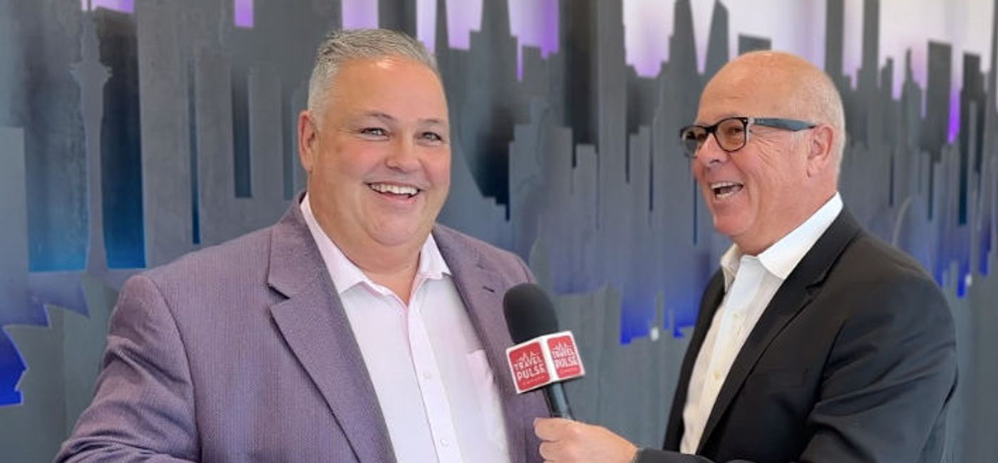 Photo: John Kirk with Sunwing Vacations Group President, Andrew Dawson