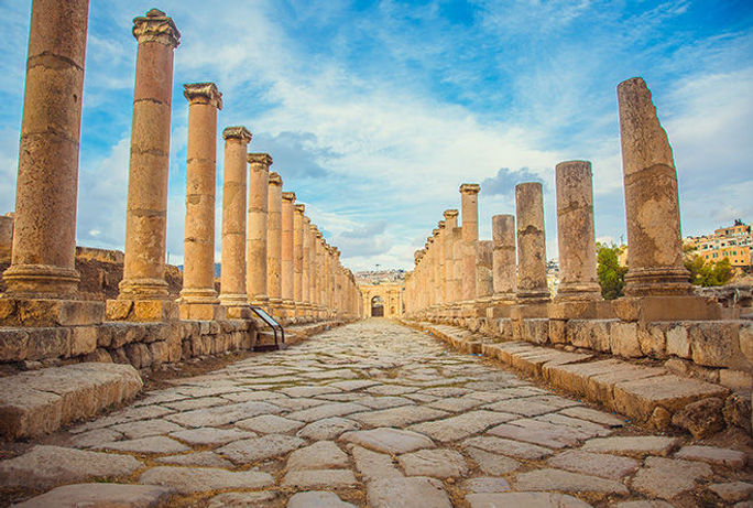 Ancient Roman ruins, walkway along the columns in Jerash, Jordan