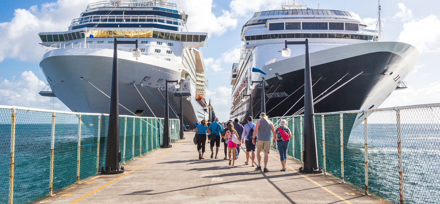 Image: Cruise passengers return to ships at Port Zante in St Kitts. (photo via Mariakray/iStock Editorial/Getty Images Plus)