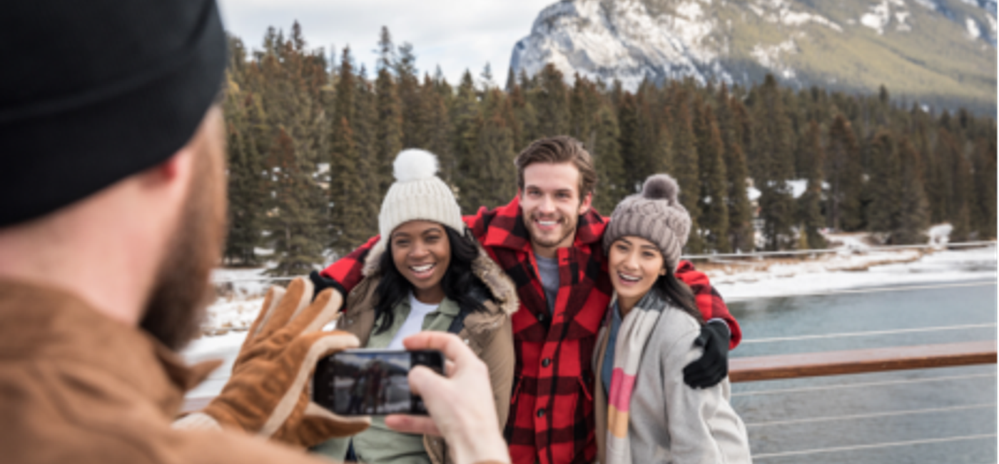 Image: PHOTO: Travelers taking photos by in Canada's Rocky Mountains ((photo via The Travel Corporation))