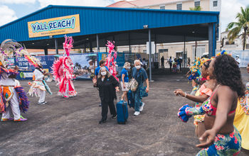 Dancers greet passengers