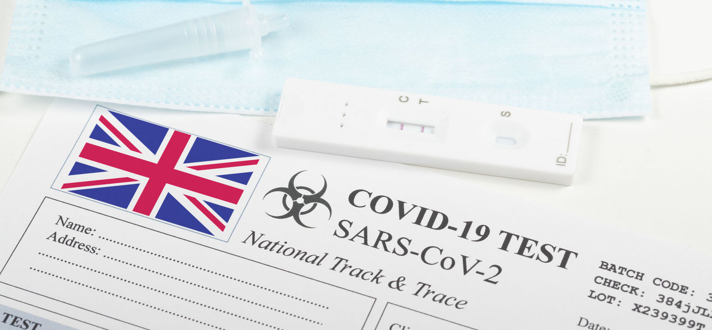 Image: COVID-19 lateral flow test and result form with U.K. flag. (photo via iStock/Getty Images Plus/Thomas Faull)
