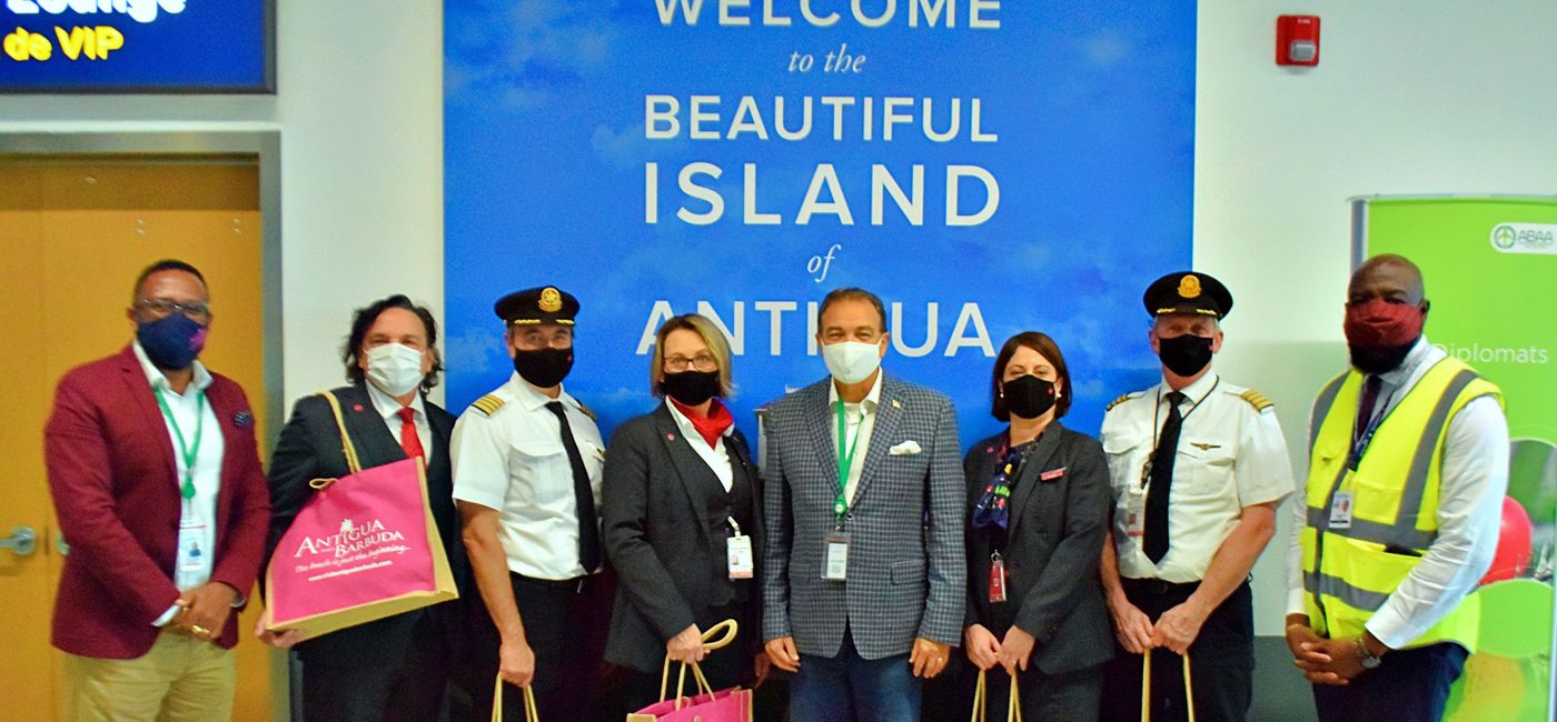 Image: Air Canada Crew Welcomed to Antigua and Barbuda. AC began flights to the island nation again on Dec. 6, 2020. (Antigua and Barbuda Tourism Authority)