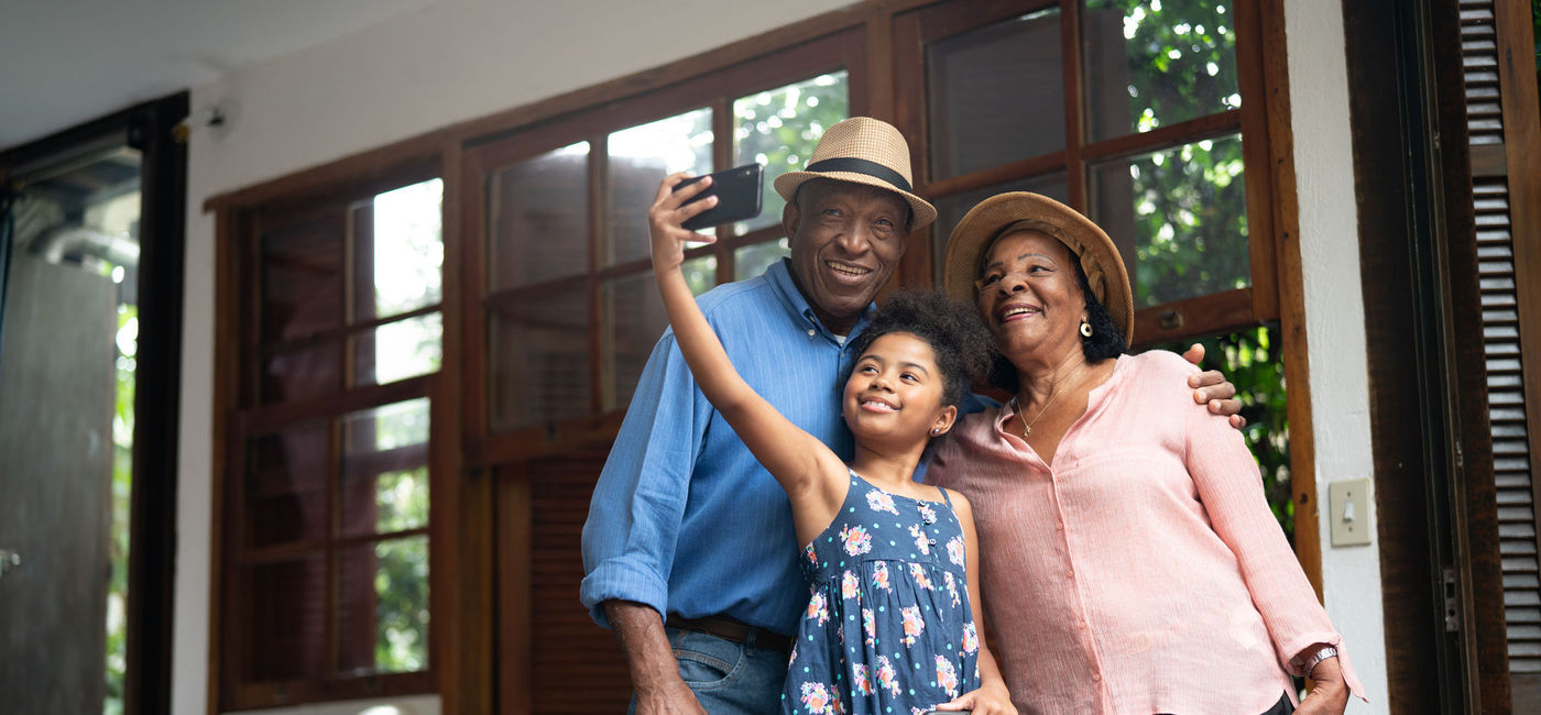 Image: Grandparents and granddaughter on vacation. (photo via E+ /  FG Trade)