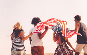 Friends with American flag.