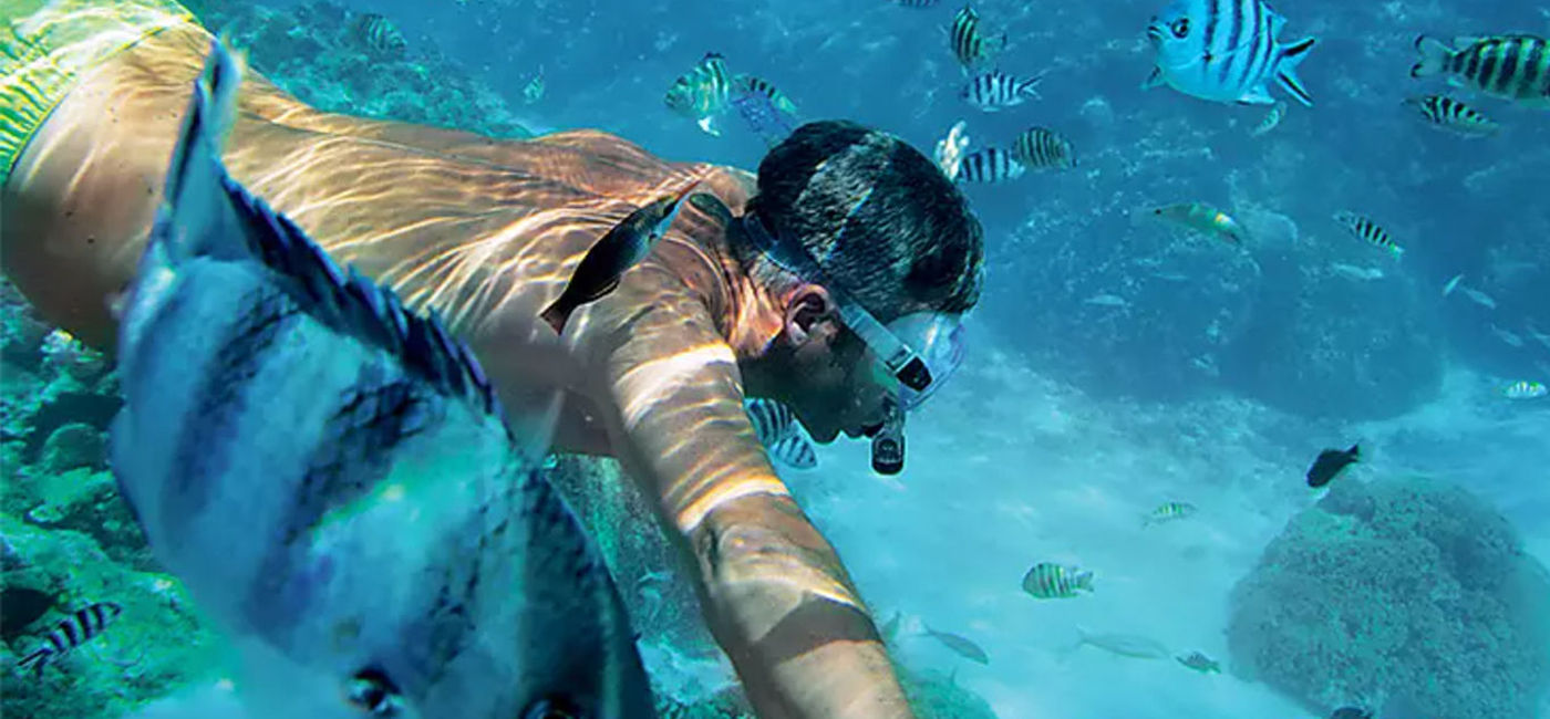Image: Snorkeling in Tahiti (photo courtesy Paul Gauguin Crusies) (Photo Credit: Paul Gauguin Cruises)