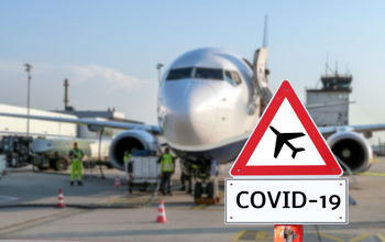 Coronavirus sign at airport.