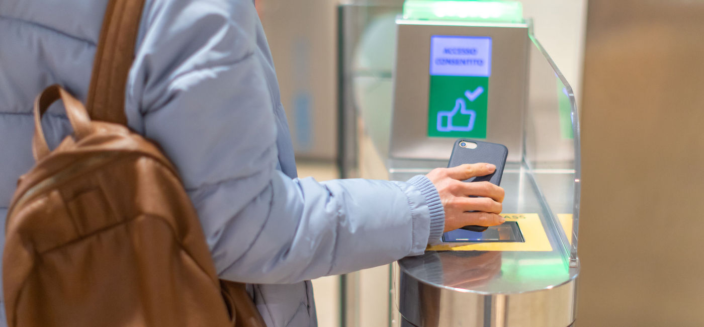 Image: Electronic boarding pass and passport control in the airport. (Photo via iStock/Getty Images Plus/Alina Rosanova)