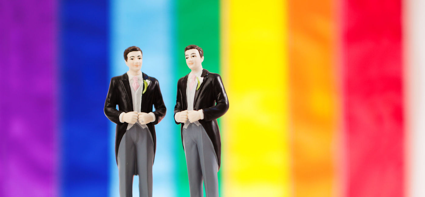 Image: Same Sex Marriage Wedding Cake with Rainbow Flag (photo via YinYang / Getty Images)