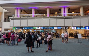 Crowd of people waiting for TSA security line at Orlando Airport