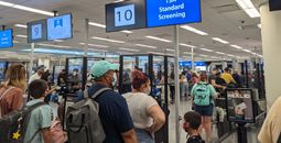 TSA security line, TSA security, TSA, Orlando Airport, Face Mask, travelers, airport crowd