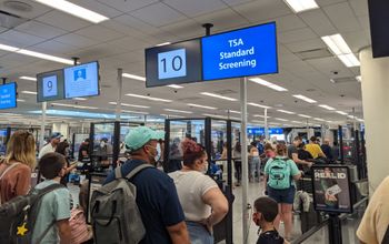 TSA security line, TSA security, TSA, Orlando Airport, Face Mask, travelers, airport crowd