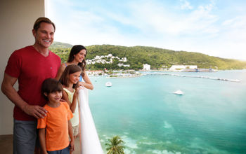 Family enjoying balcony views