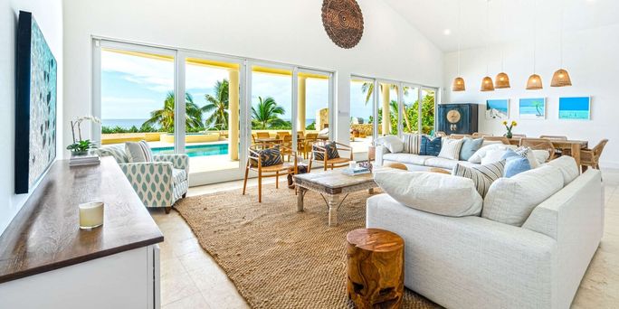 The living room inside Turtle Beach, a Rental Escapes villa in George Town, Grand Cayman. Rental Escapes, Grand Cayman, villas, luxury villa