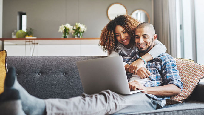 young couple on laptop