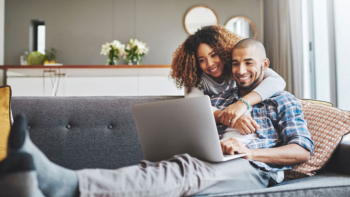 young couple on laptop young couple on laptop