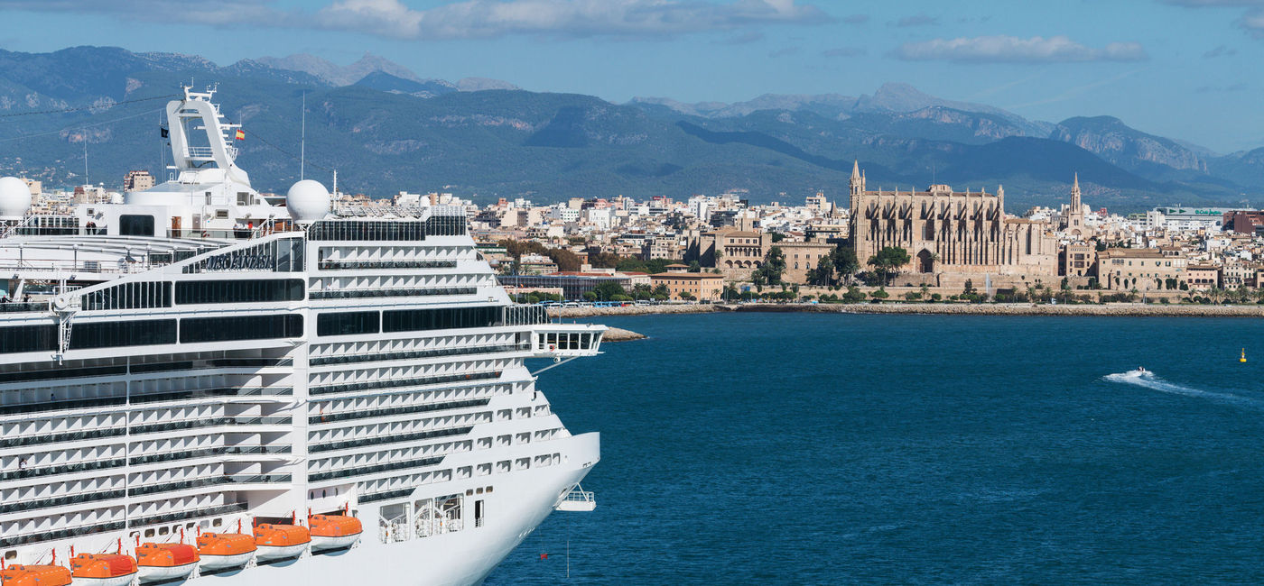 Image: PHOTO: Cruise ship moored at the port of Palma de Mallorca. (Photo via iStock Unreleased / Getty Images / imantsu)