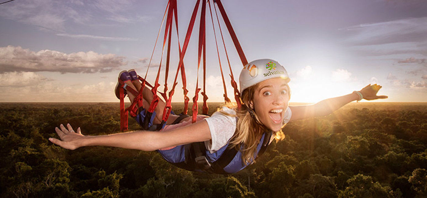 Image: Zip-lining through the Mayan rainforest in Mexico. (Photo courtesy of Palace Resorts)