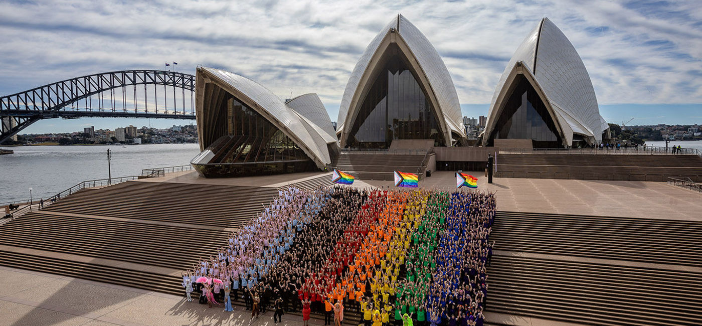 Image: A rainbow of a crowd stands in front of Sydney's famous Opera House. (Photo by Daniel Boud) (Photo by Daniel Boud.)