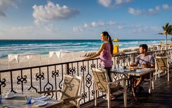 couple enjoying a meal at Hyatt Zilara Cancun