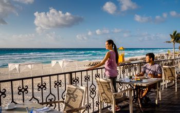 couple enjoying a meal at Hyatt Zilara Cancun