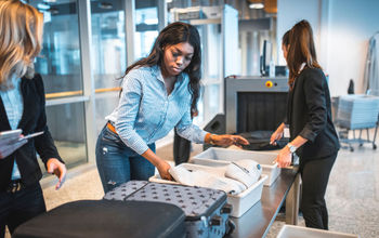 black woman, tsa, security, airport