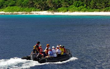 Guests in zodiac boat to the Seychelles’ Vallee de Mai Nature Reserve.