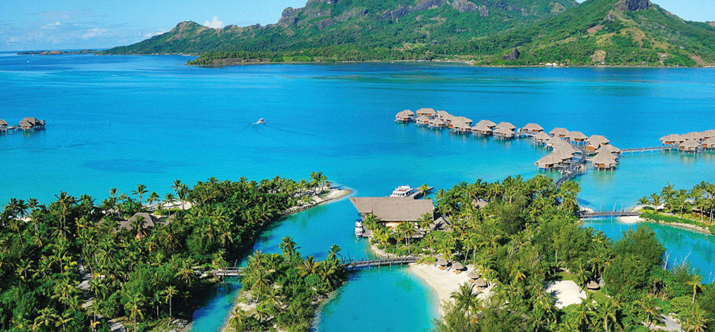 Image: PHOTO: Four Seasons Resort Bora Bora is celebrating the 50th anniversary of the overwater bungalow with a sale. (Photo courtesy of Four Seasons Hotels & Resorts)