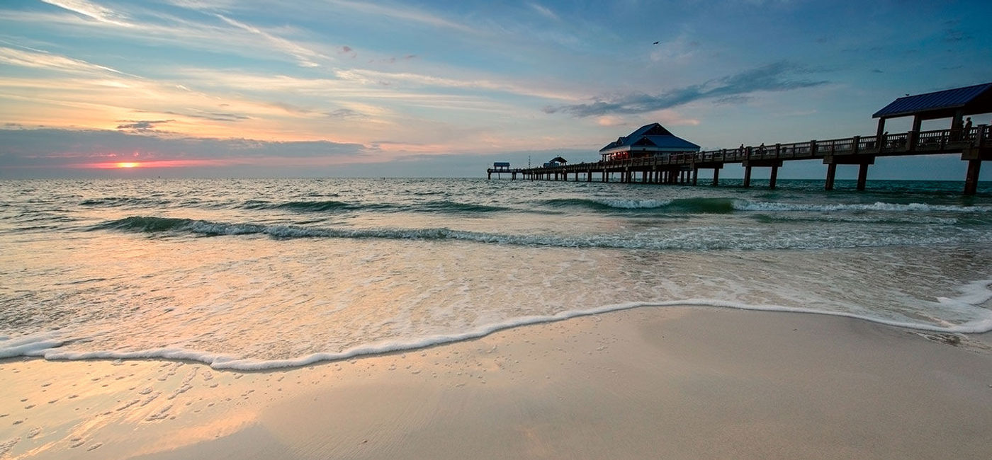 Image: PHOTO: Sunset on Clearwater Beach. (Photo via liseykina / iStock / Getty Images Plus)