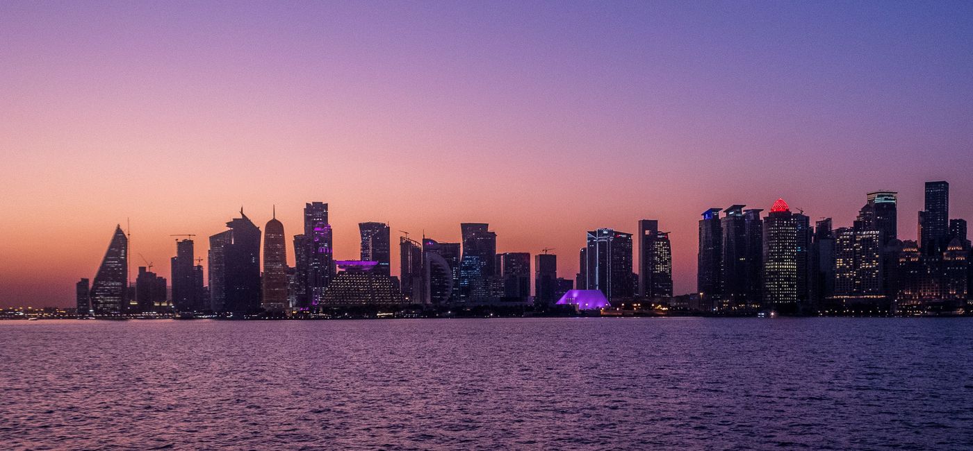 Image: Skyscrapers on the Doha Corniche at dusk. (Photo by Scott Laird)