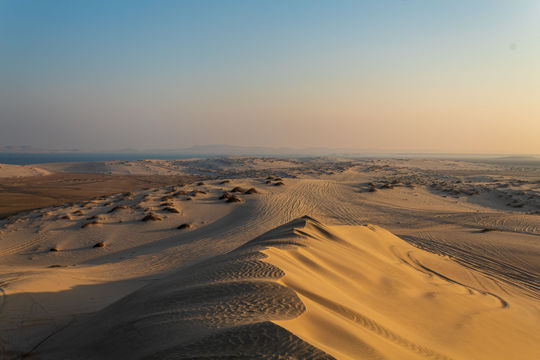 Desert scape in the late afternoon casting shadows