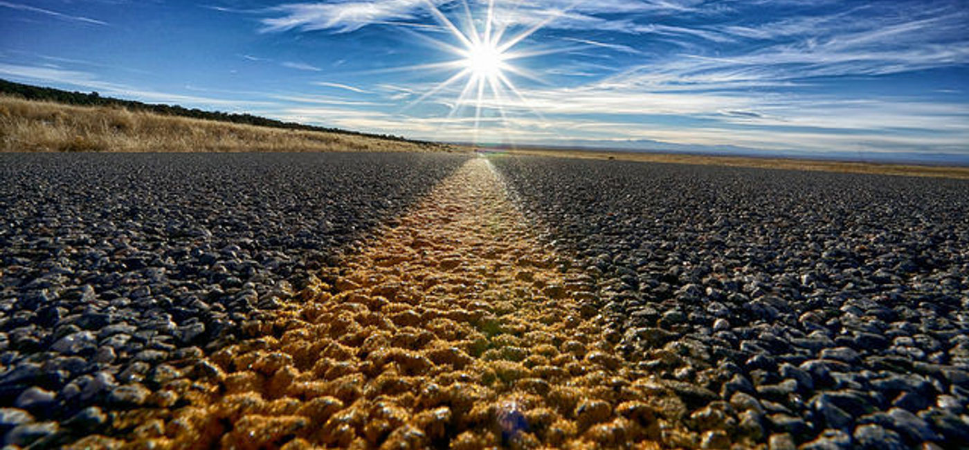 Image: PHOTO: A closeup of Colorado asphalt and the road ahead. (photo via Flickr/Max and Dee Bernt)